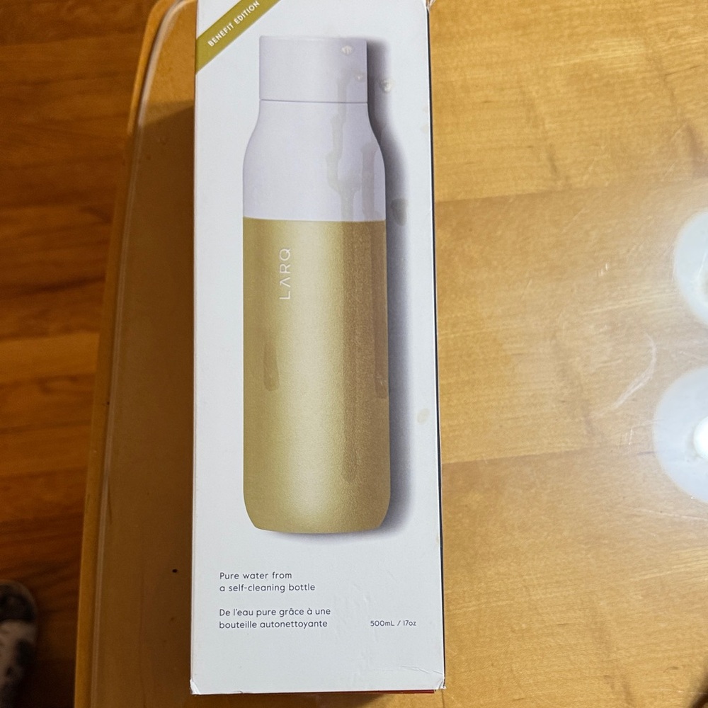 ARQ White and Gold Self-Cleaning Bottle